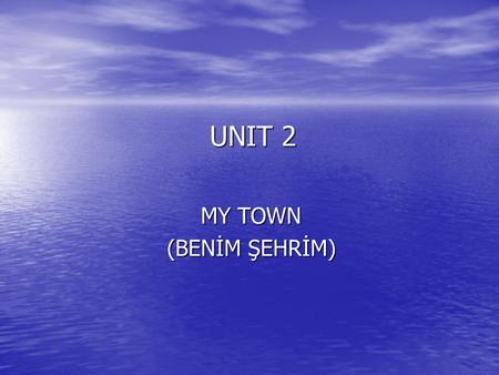 UNIT 2 MY TOWN (BENİM ŞEHRİM). LIBRARY = KÜTÜPHANE LIBRARY = KÜTÜPHANE CITY HALL = RESMİ BİNA CITY HALL = RESMİ BİNA OLD = ESKİ OLD = ESKİ PEACEFUL =